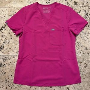 Figs pink scrub top in size small, one pocket